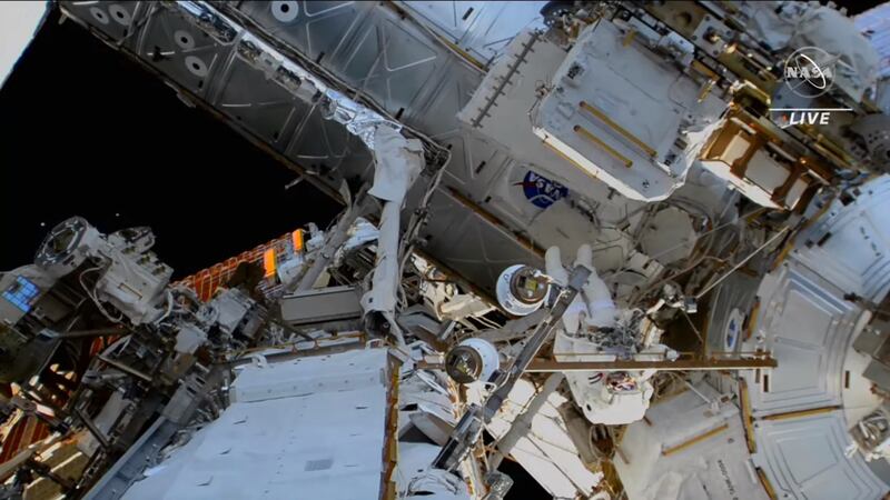 The astronauts outside the space station