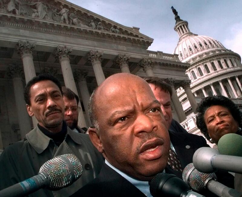 US Representative John Lewis speaks with reporters in Washington, DC, on March 5, 1999. AP Photo