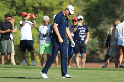 DUBAI, UNITED ARAB EMIRATES - NOVEMBER 19:  Justin Rose of England reacts to his second shot on the 11th hole during the final round of the DP World Tour Championship at Jumeirah Golf Estates on November 19, 2017 in Dubai, United Arab Emirates.  (Photo by Andrew Redington/Getty Images)