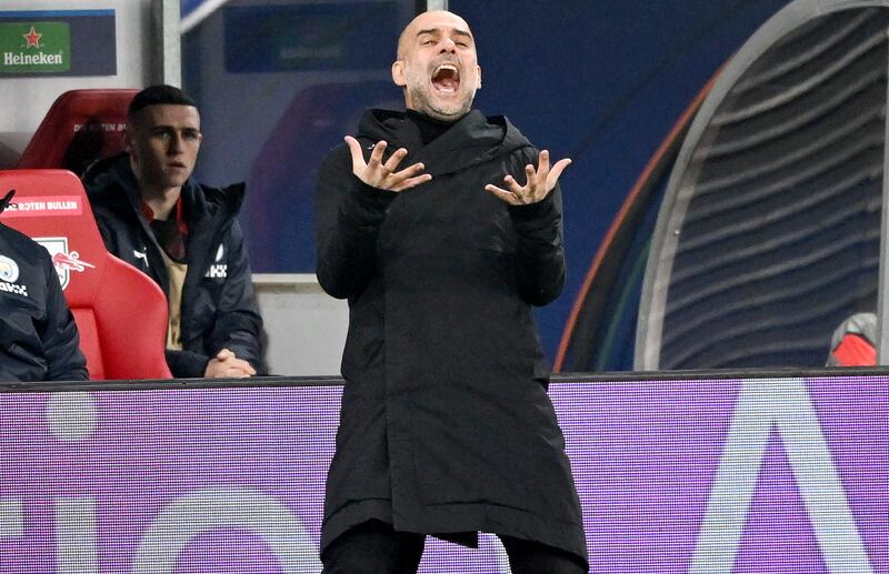 Manchester City manager Pep Guardiola looks frustrated on the sidelines. EPA
