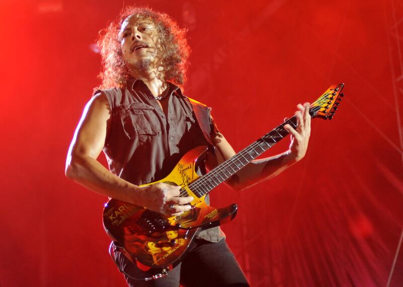ADDS BYLINE
Metallica's Kirk Hammett performs on Abu Dhabi's Yas Island late on October 25, 2011, as part of the group's World Magnetic tour concert .    AFP PHOTO /ODAI AFANEH / AFP PHOTO / Odai Afaneh