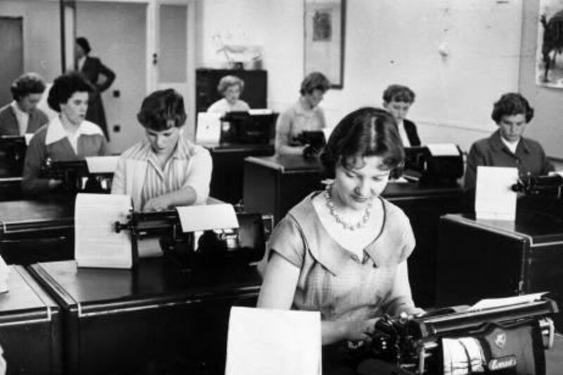 Women work at a typing Pool in teh 1950s. Photo Courtesy Getty Images