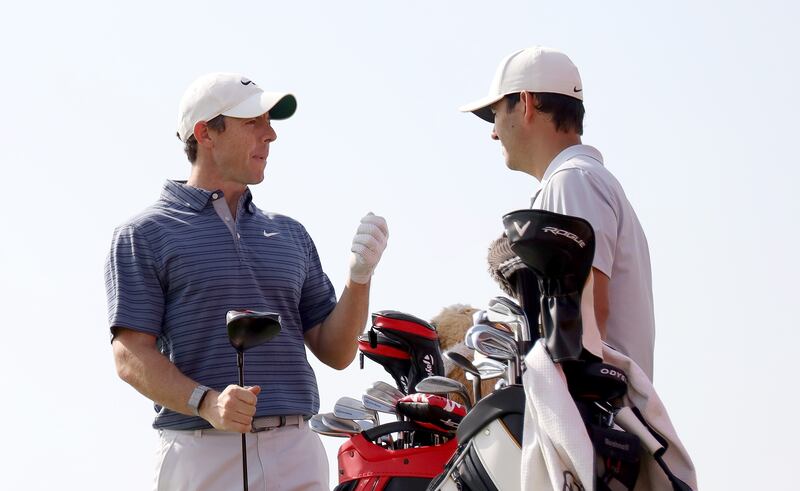 Rory McIlroy with caddy Harry Diamond at Yas Links Golf Course. Getty
