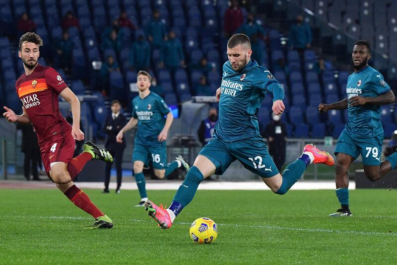 AC Milan's Croatian forward Ante Rebic kicks the ball. AFP