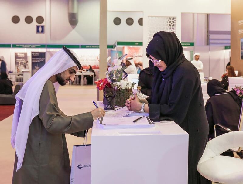 A graduate registers his details at the Sharjah Job Fair recently. Victor Besa for The National