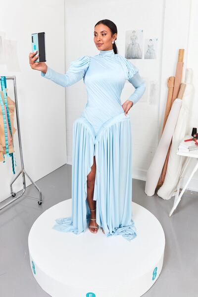 Maya Jama posing in the 5G dress designed by Richard Malone.