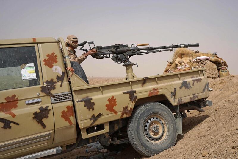 Fighters with forces loyal to Yemen's internationally recognised government hold a position against Houthi rebels in Yemen's northeastern province of Marib. AFP