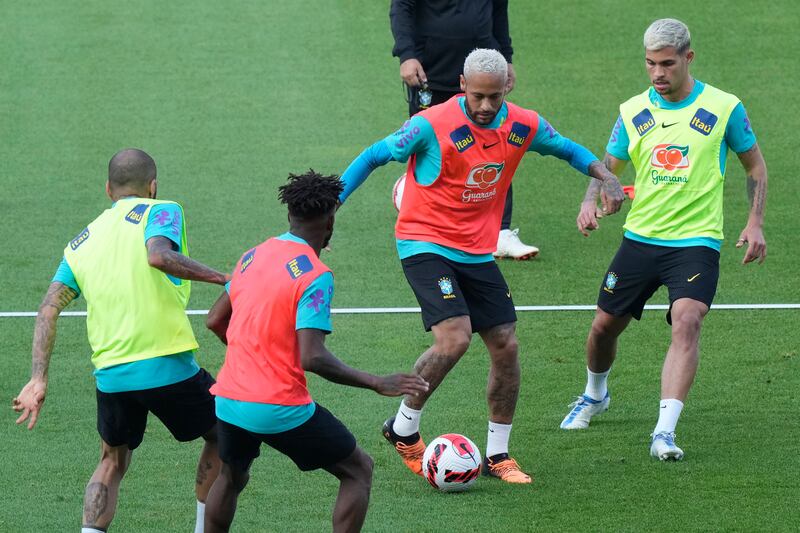 Brazil's Neymar, second from right, controls the ball during a training session at Goyang Stadium in South Korea. AP