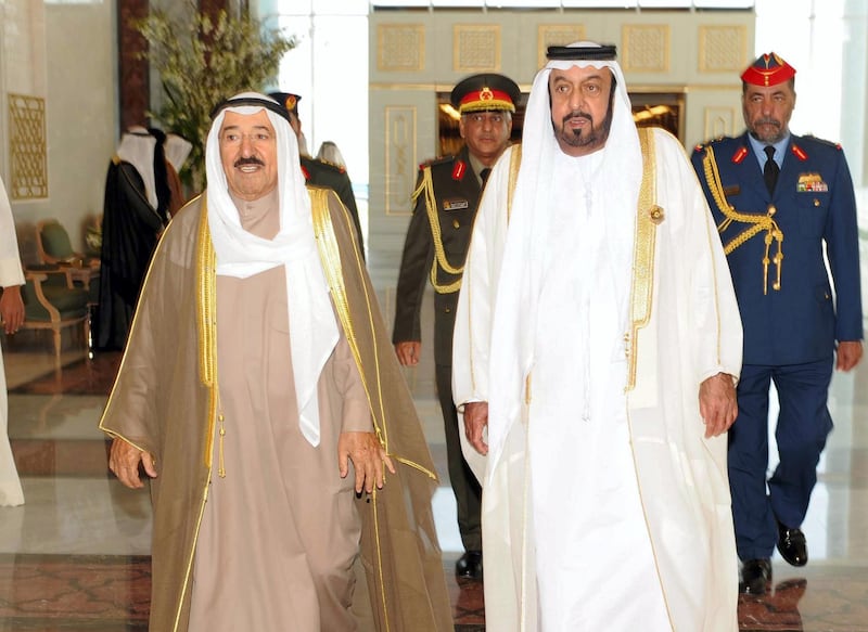 epa02483155 A handout picture released by Emirates News Agency (WAM) shows United Arab Emirates President Sheikh Khalifa bin Zayed Al Nahyan (R) walks with His Highness the Amir of the State of Kuwait Sheikh Sabah Al-Ahmad Al-Jaber Al-Sabah (L), during his arrival to Abu Dhabi to attend the GCC Summit, United Arab Emirates, 06 December 2010.  EPA/EMIRATES NEWS AGENCY / HANDOUT  EDITORIAL USE ONLY *** Local Caption *** 02483155