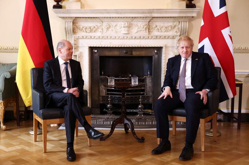 German Chancellor Olaf Scholz with UK Prime Minister Boris Johnson, during his first visit to London since succeeding Angela Merkel as Germany's leader. AFP