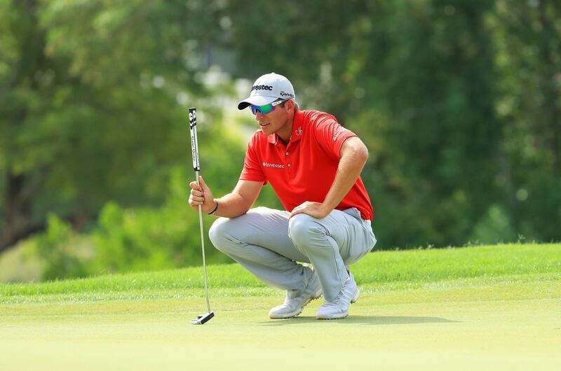 DUBAI, UNITED ARAB EMIRATES - NOVEMBER 16:  Dean Burmester of South Africa lines up a putt on the 12th green during day two of the DP World Tour Championship at Jumeirah Golf Estates on November 16, 2018 in Dubai, United Arab Emirates.  (Photo by Andrew Redington/Getty Images)