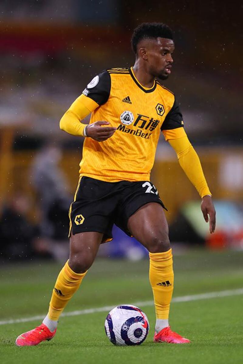 WOLVERHAMPTON, ENGLAND - FEBRUARY 19: Nelson Semedo of Wolverhampton Wanderers runs with the ball during the Premier League match between Wolverhampton Wanderers and Leeds United at Molineux on February 19, 2021 in Wolverhampton, England. Sporting stadiums around the UK remain under strict restrictions due to the Coronavirus Pandemic as Government social distancing laws prohibit fans inside venues resulting in games being played behind closed doors. (Photo by Alex Pantling/Getty Images)