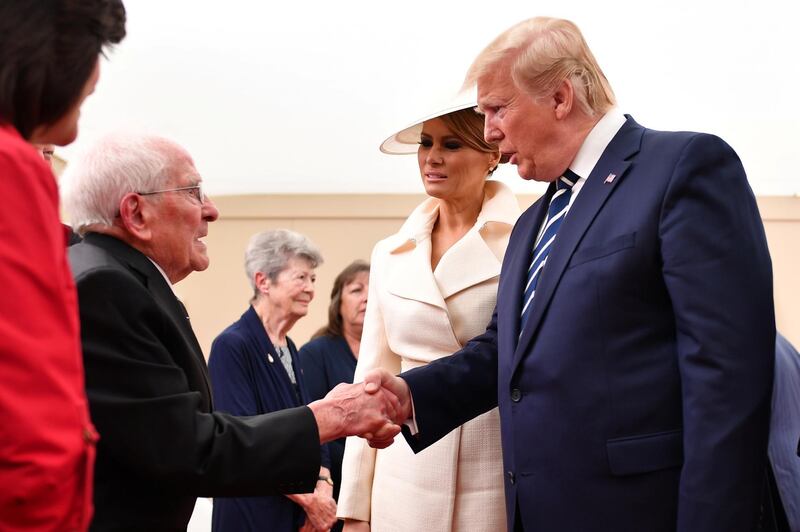 US President Donald Trump and First Lady Melania Trump meet veterans during the D-Day 75 National Commemorative event in Portsmouth, Britain.  Reuters