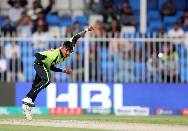 Sharjah, United Arab Emirates - February 23, 2019:  Lahore's Sandeep Lamichhane bowls during the game between Lahore Qalandars and Quetta Gladiators in the Pakistan Super League. Saturday the 23rd of February 2019 at Sharjah Cricket Stadium, Sharjah. Chris Whiteoak / The National