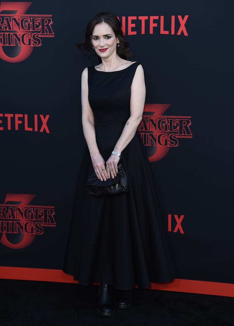 Winona Ryder in a black dress for the season 3 premiere of 'Stranger Things' on June 28, 2019, in Santa Monica, California. AP