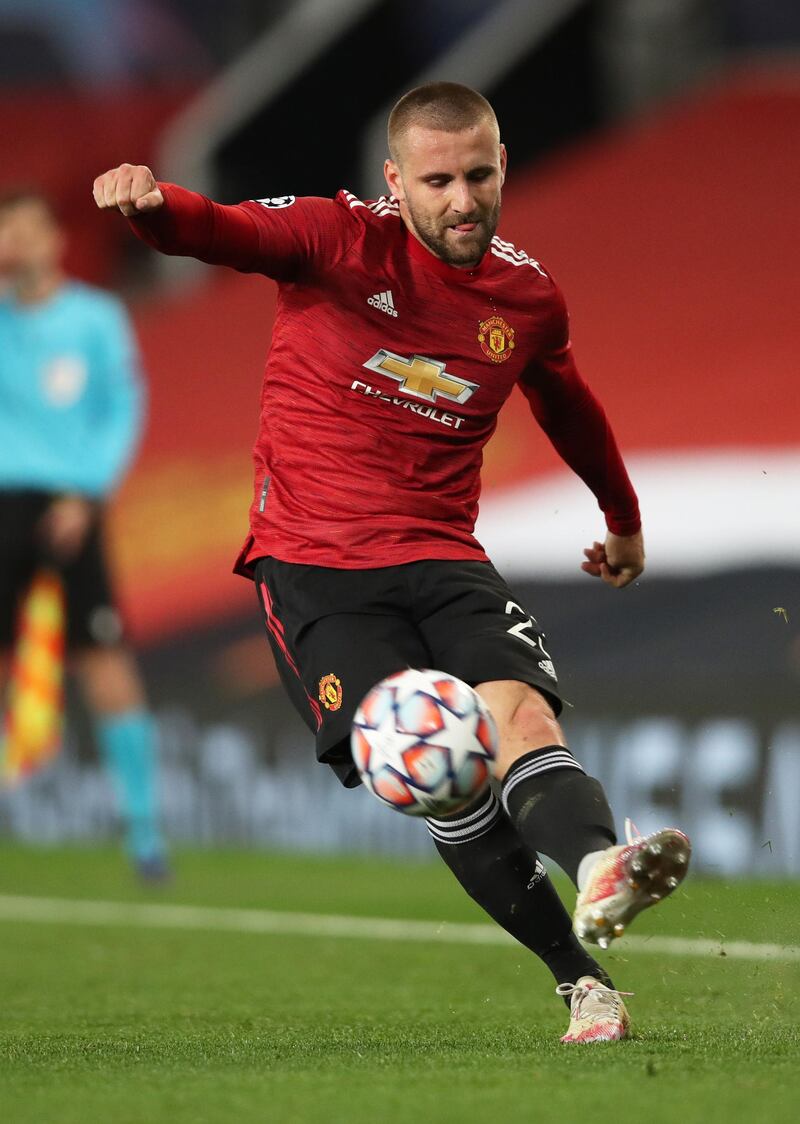 MANCHESTER, ENGLAND - OCTOBER 28: Luke Shaw of Manchester United in action during the UEFA Champions League Group H stage match between Manchester United and RB Leipzig at Old Trafford on October 28, 2020 in Manchester, England. Sporting stadiums around the UK remain under strict restrictions due to the Coronavirus Pandemic as Government social distancing laws prohibit fans inside venues resulting in games being played behind closed doors. (Photo by Clive Brunskill/Getty Images)