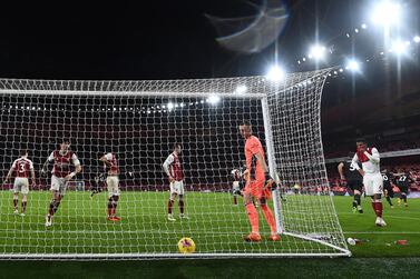 Arsenal players react after Pierre-Emerick Aubameyang scores an own goal, the only game of the game in the defeat against Burnley. AP