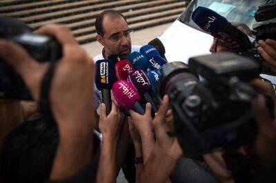 Suleyman Rissouni, uncle of journalist Hajar Rissouni and editor in chief of Akhbar Al-Youm daily newspaper, speaks to the media after the court delivered a one year prison sentence to his niece on accusations of her undergoing an illegal abortion, in Rabat, Morocco, Monday, Sept. 30, 2019. The 28-year old Moroccan journalist Hajar Raissouni was sentenced to one year in prison, Monday, while her fiancÃ© also received a one-year sentence and the doctor accused of terminating the pregnancy was sentenced to two years in jail and suspended from practicing. (AP Photo/Mosa'ab Elshamy)