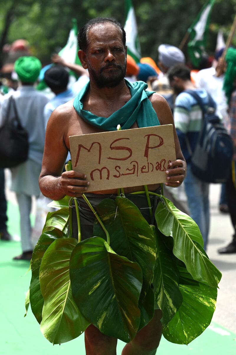 A farmer participates in a protest against the central government policies, in New Delhi.