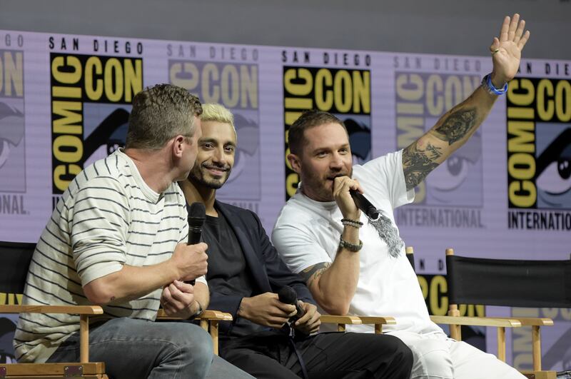 Ruben Fleischer, from left, Riz Ahmed and Tom Hardy attend the "Venom" panel on day two of Comic-Con International on Friday, July 20, 2018, in San Diego. (Photo by Richard Shotwell/Invision/AP)