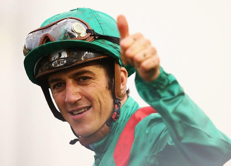 Christophe Soumillon celebrates after riding Vazirabad to victory in the Dubai Gold Cup. Francois Nel / Getty Images