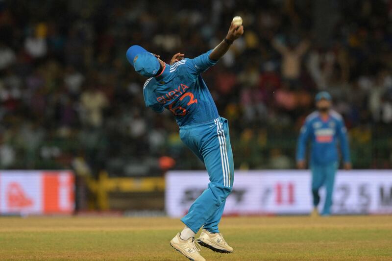 India's Suryakumar Yadav celebrates after taking the catch of Sri Lanka's Maheesh Theekshana. AFP
