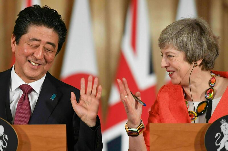 Mrs May with Japanese PM Shinzo Abe. AP
