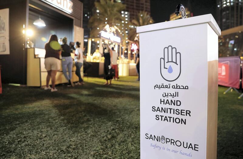 DUBAI , UNITED ARAB EMIRATES , December 18 – 2020 :- Hand sanitiser station installed at various points of the park at the Etisalat Market OTB at the Burj Park in downtown Dubai on the second day of the DSF opening concert in Dubai. ( Pawan Singh / The National ) For Arts & Culture/Online/Instagram. Story by Janice Rodrigues