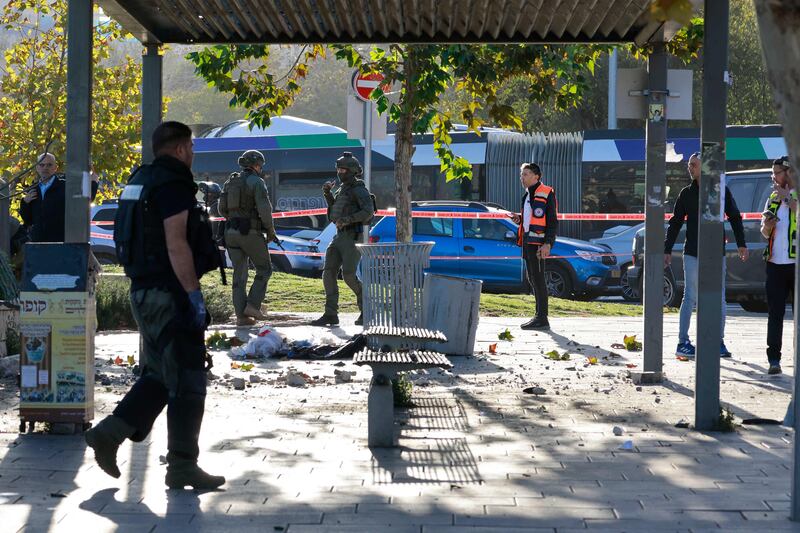 Israeli security personnel at the scene of an explosion at a bus stop in Jerusalem. AFP