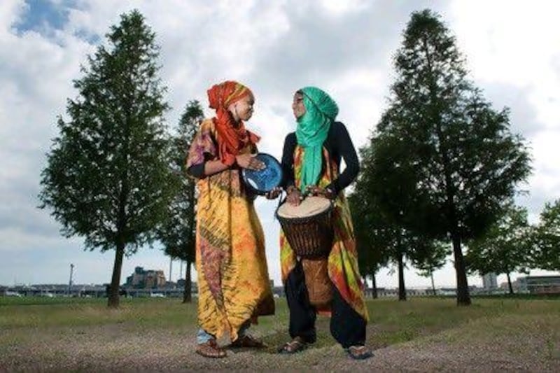 Sakinah, left, and Rabiah Abdullah make up the hijab-wearing rappers Pearls of Islam.