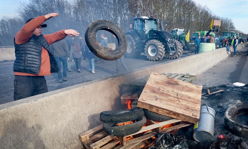 Members of the Federation of Young Farmers block the highway in Daussoulx, Belgium. EPA