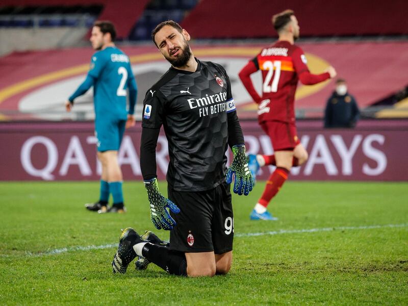 Milan's goalkeeper Gianluigi Donnarumma reacts after conceding a goal during the Italian Serie A match against AS Roma at the Stadio Olimpico. EPA