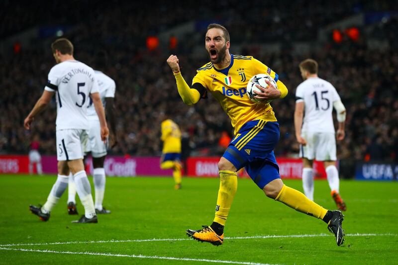 LONDON, ENGLAND - MARCH 07:  Gonzalo Higuain of Juventus celebrates after scoring the equalising goal during the UEFA Champions League Round of 16 Second Leg match between Tottenham Hotspur and Juventus at Wembley Stadium on March 7, 2018 in London, United Kingdom.  (Photo by Julian Finney/Getty Images)