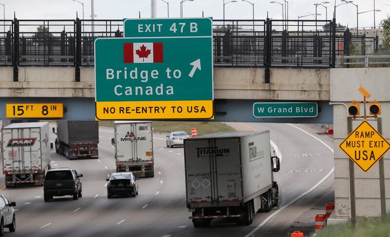 A commercial truck exits the highway for the Bridge to Canada, in Detroit, Michigan U.S. August 30, 2018.  REUTERS/Rebecca Cook