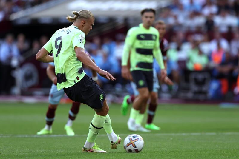 Erling Haaland scores from the penalty spot. Getty