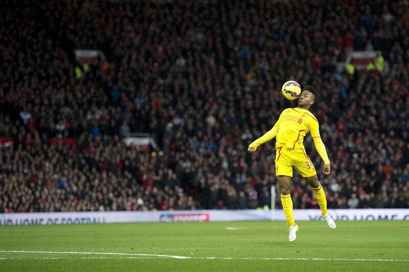 Liverpool's Raheem Sterling controls the ball during his side's Premier League loss to Manchester United on Sunday. Oli Scarff / AFP / December 14, 2014