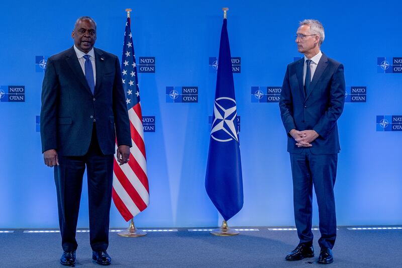 Nato Secretary General Jens Stoltenberg and US Defence Secretary Lloyd Austin arrive to take part in the defence ministers' meeting in Brussels. Getty.