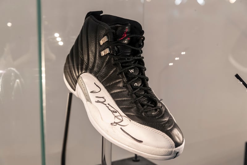 A signed Air Jordan XIV trainer is part of The Dynasty Collection on display at Sotheby’s Dubai. All photos: Antonie Robertson / The National