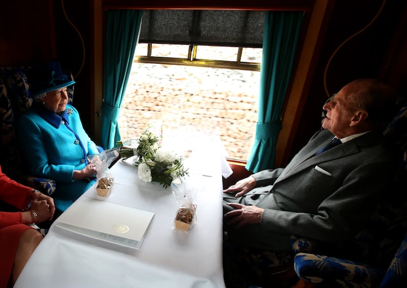 Queen Elizabeth and Prince Philip inaugurate the new Scottish Borders Railway in 2015, on the day she became Britain's longest-reigning monarch. Getty