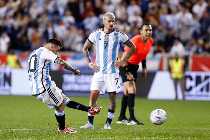 Argentina's Lionel Messi scores from a free-kick. AFP