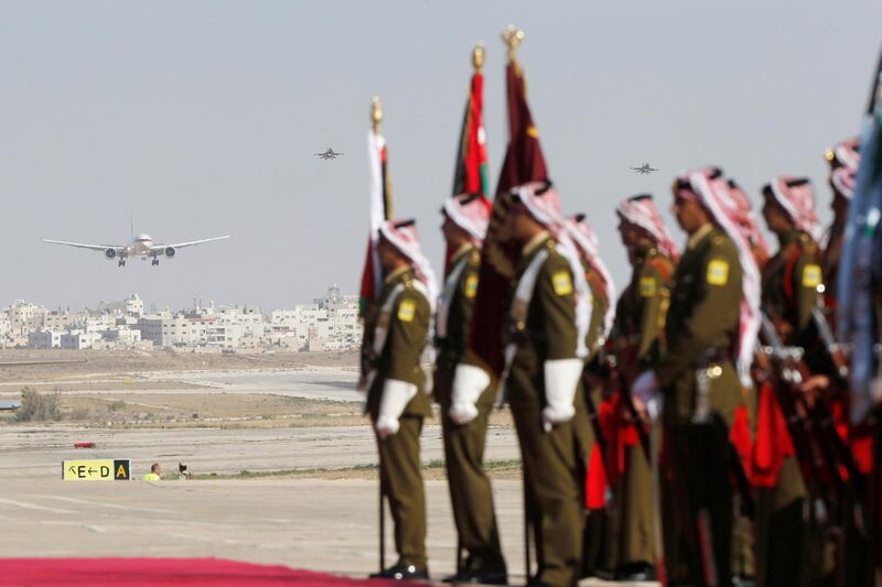 Abu Dhabi's Crown Prince Sheikh Mohammed bin Zayed's plane is seen coming in to land as Jordanian honour guards stand at Amman military airport, Jordan. Reuters