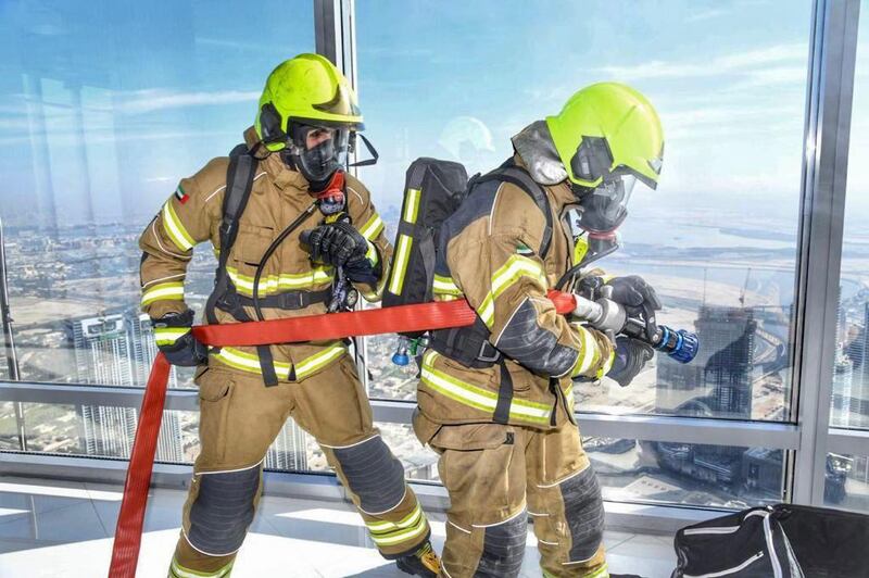 Firefighters get ready for annual Burj Khalifa evacuation drill on Monday. Photos: Dubai Civil Defence