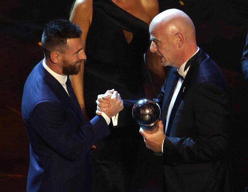 Argentinian Lionel Messi receives the The Best FIFA Men's Player award from FIFA president Gianni Infantino.  EPA