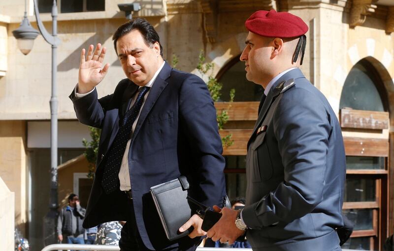 Lebanon's Prime Minister Hassan Diab arrives to discuss the state budget at parliament. Reuters