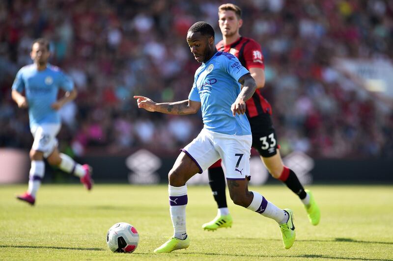 Manchester City's Raheem Sterling runs with the ball against Bournemouth. AFP