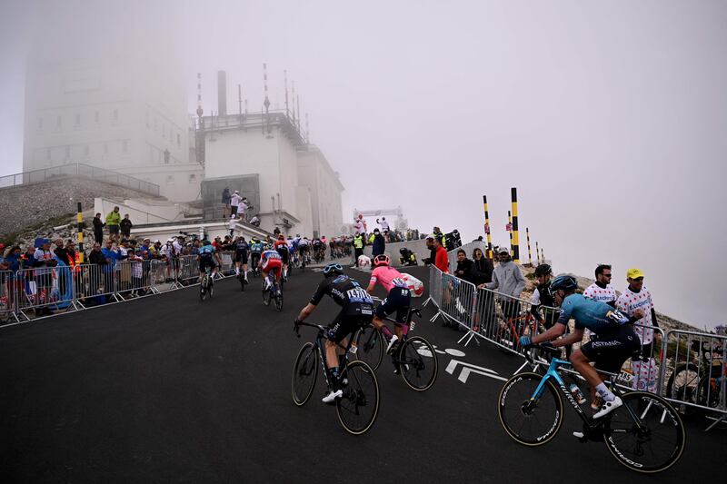 Tke peloton reaches the summit of Mont Ventoux.