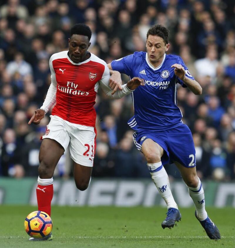 Danny Welbeck, left, vies with Chelsea's Nemanja Matic. Ian Kington / AFP