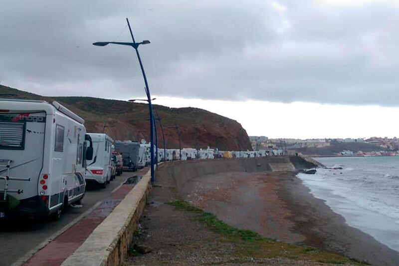Stranded tourists in motor homes queue in northern Morocco, near the Spanish enclave of Ceuta. AP