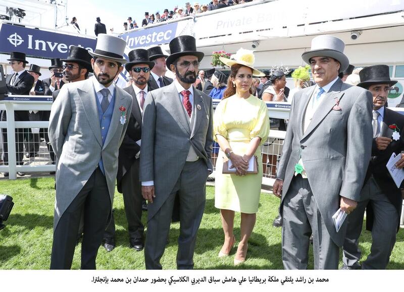 Sheikh Mohammed bin Rashid, Vice President and Ruler of Dubai, Sheikh Hamdan bin Mohammed, Crown Prince of Dubai, and Princess Haya bint Al Hussein, wife of Sheikh Mohammed, attend the Investec Derby Festival at the Epsom Downs Racecourse on Saturday. Wam