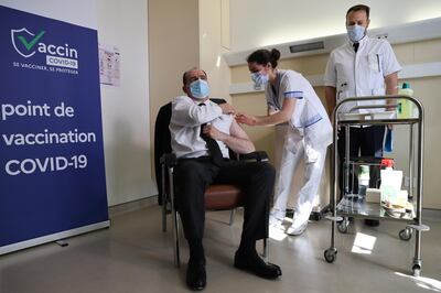 epa09083950 Prime Minister Jean Castex, 55-years-old, reacts as he is vaccinated with the AstraZeneca Covid-19 vaccine at the Hopital d'Instruction des Armees Begin, in Saint-Mande, on the outskirts of Paris, France, 19 March 2021. Castex is given the vaccine to boost confidence in the jab after the European medicine watchdog ruled it was safe to use. France's health authority recommended that only people aged 55 and over should be given the AstraZeneca Covid-19 vaccine due to reports of blood clots, while giving the green light to resume its use after a brief suspension.  EPA/THOMAS COEX / POOL  MAXPPP OUT